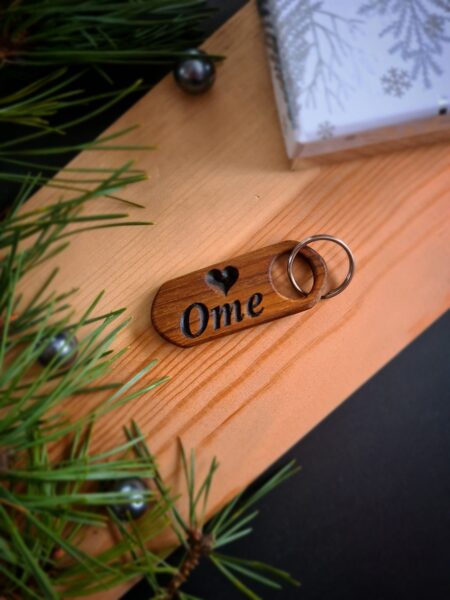 Ome (ar sirsniņu)